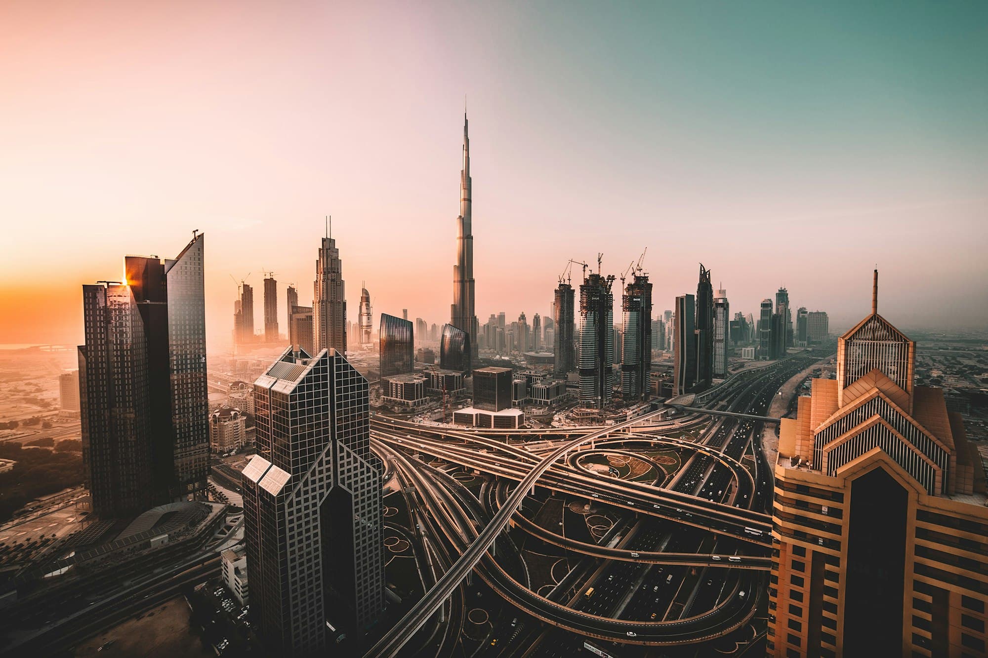 The Dubai skyline glowing at sunset